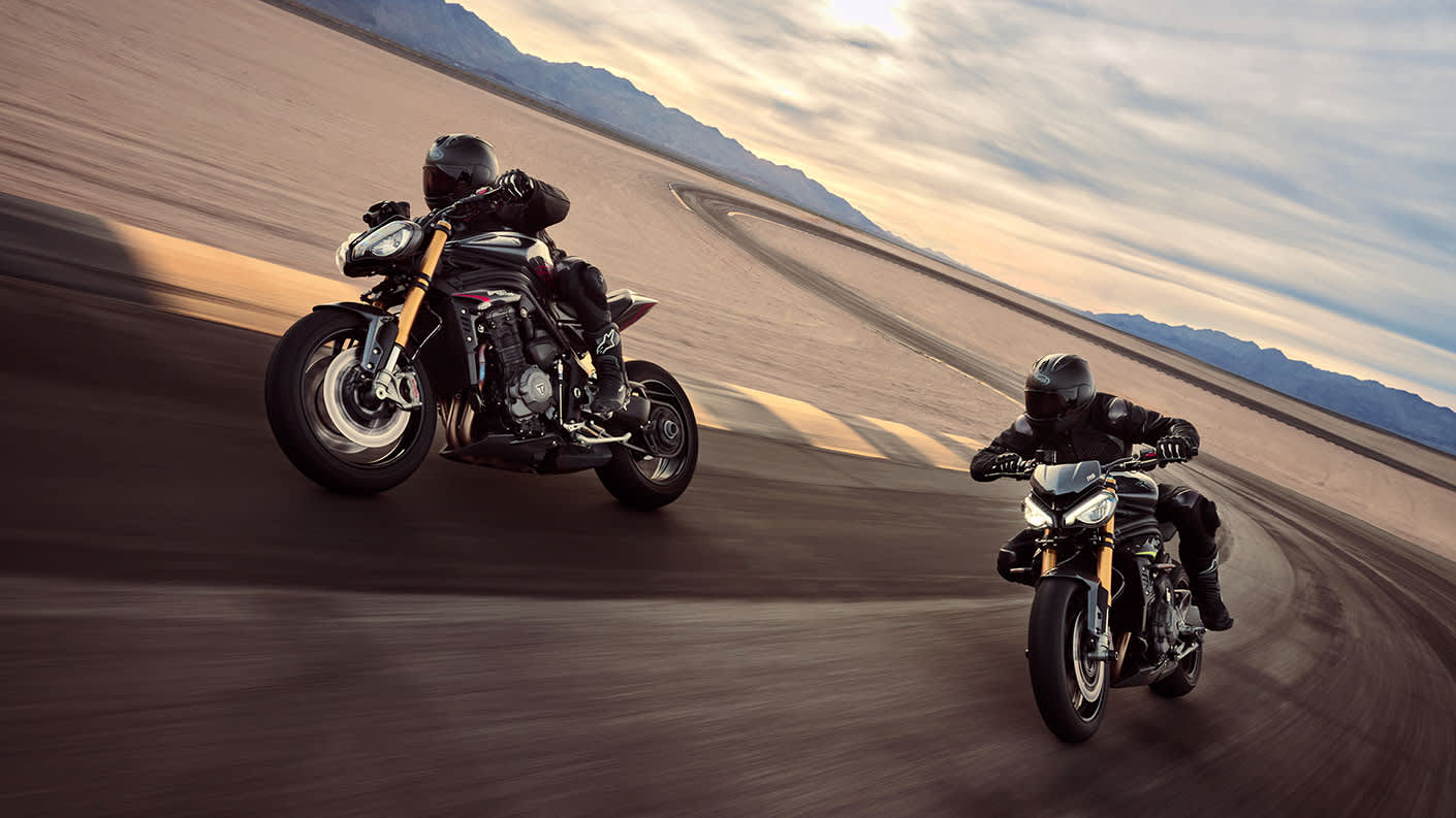 Speed Triple 1200 RS 2025 riding on an empty track